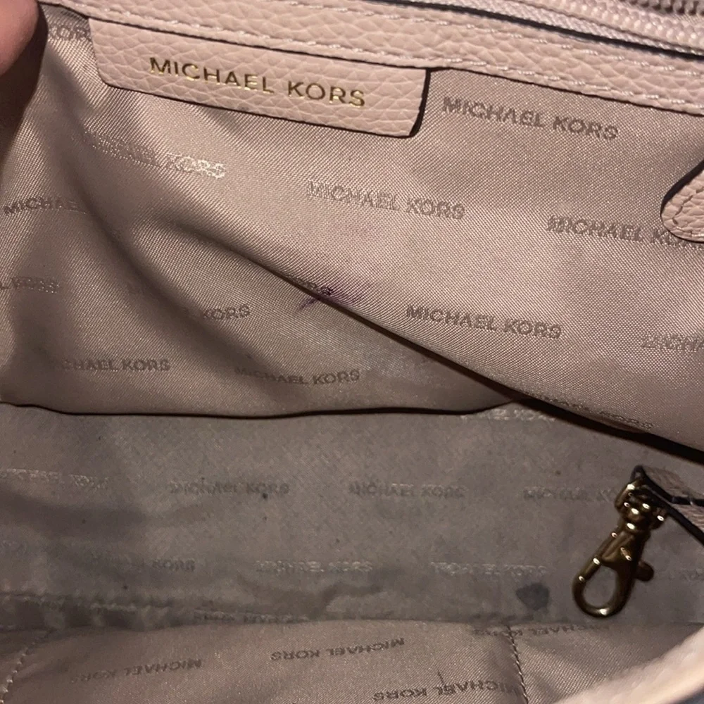 Michael Kors questions leave